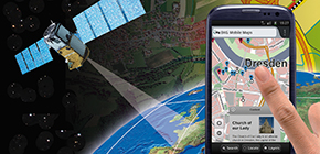 verweist auf: Wir über uns Bild zeigt eine Collage mit Erde, Satellit, Karte und Handy (verweist auf: Wir über uns)